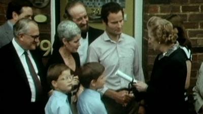 Margaret Thatcher hands over deeds to one of the first council houses bought under the 'Right To Buy' scheme