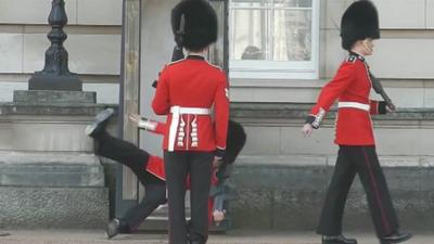 Guard falling over