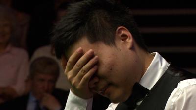 China's Ding Junhui makes a mess of a chance of 147 maximum break at the World Snooker Championships in Sheffield