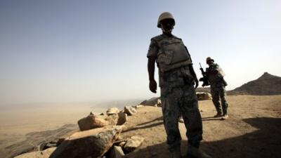 Saudi soldier stands alert at Yemen border