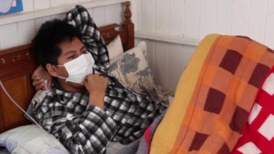 MDR-TB patient in bed