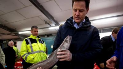 Nick Clegg with a fish