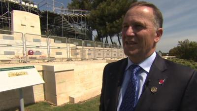 New Zealand PM John Key speaking to the BBC at a memorial to the Anzac troops who died at Gallipoli in 1915