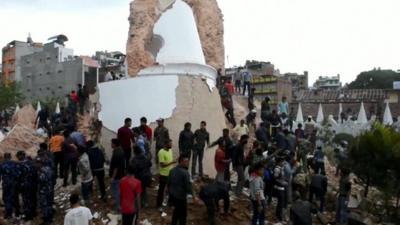 People in the rubble of the tower