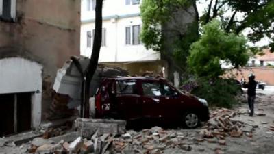 A car crushed by bricks