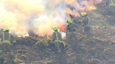 South Wales firefighters tackle grassfire in Rhondda Cynon Taff