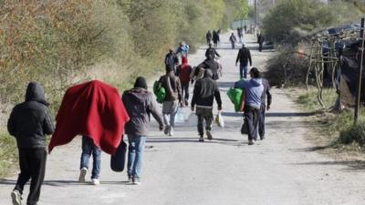 Migrants in a camp near Calais