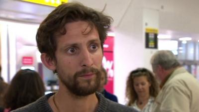 Nepal earthquake survivor Tom Greensmith after arriving back in UK