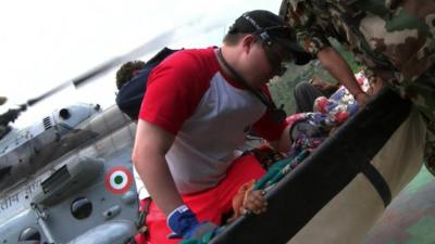 Rescue team treating a patient