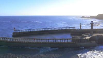 The entrance to Whitby harbour