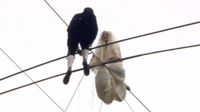 Chris Bull and Pheobe Baker on a high wire
