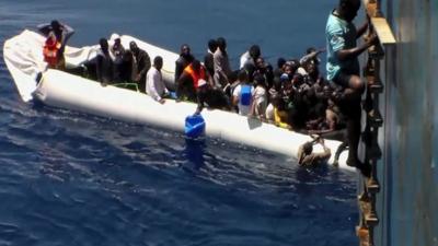 Migrants scramble to safety