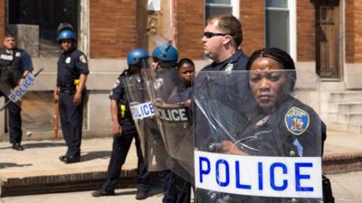 Police with shields in Baltimore