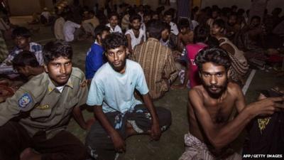 A group of rescued migrants mostly Rohingya migrants from Myanmar and Bangladesh, passengers of the first migrants boat, are temporarily housed at a government sports auditorium in Lhoksukon in Aceh province