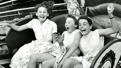 Girls on fairground ride