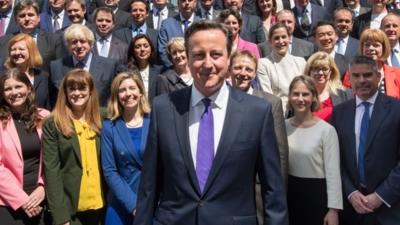 David Cameron surrounded by new MPs