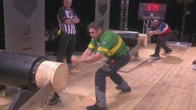 Brad Delosa at the world's lumberjack competition in Italy