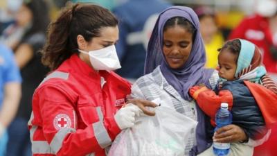 Migrants helped in Messina, Sicily