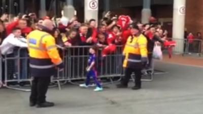 Rooney son poses for photographs