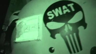 Swat logo on side of helmet