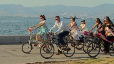 Mark Lowen with group of female cyclists