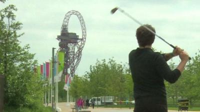 Man playing golf in Olympic park