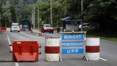 A check point is seen at the entry point to Malaysia - Thailand border in Wang Kelian, Malaysia on Sunday, May 24, 2015.