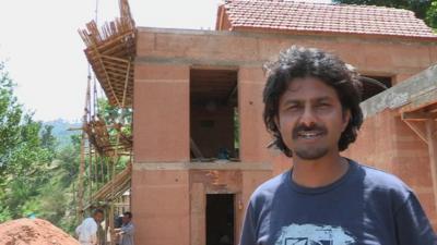 Architect Nripal Adhikary who is building houses out of local, shock-proof materials in Nepal