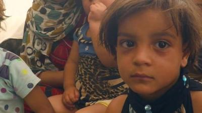 Wife and children of Mohamed Kaduri, a Sunni Muslim family who have fled Iraq's Anbar province