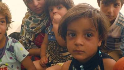 Wife and children of Mohamed Kaduri, a Sunni Muslim family who have fled Iraq's Anbar province