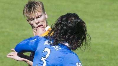 Mohsni clashes with Motherwell's Erwin