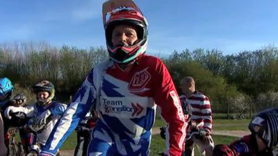 Paul Mounsey on his BMX ready to race