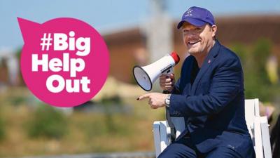 Eddie Izzard with a megaphone