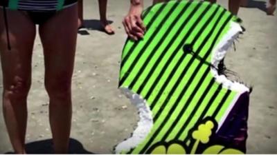 Surfboard attacked by shark