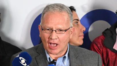 Perkins Rocha, legal advisor of the opposition party Vente Venezuela, talks to the media as he waits for the presidential election results in Caracas on 28 July 2024