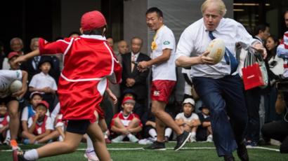 Boris Johnson Knocks Child To Ground In Touch Rugby Bbc News