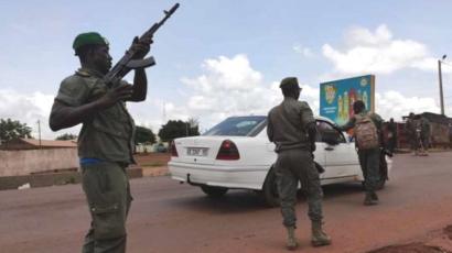 Soldiers patrol after gunshots were heard Tuesday at a military camp near Kati area in Bamako, Mali on 18 August 2020