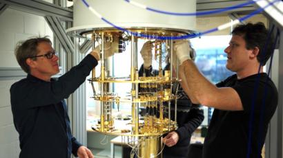 IBM staff building the fridge to store qubits at freezing temperature