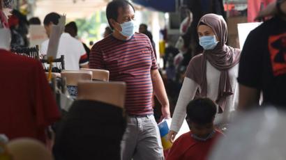 Singaporean wearing masks