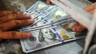 convertir de pesos colombianos a dolares americanos