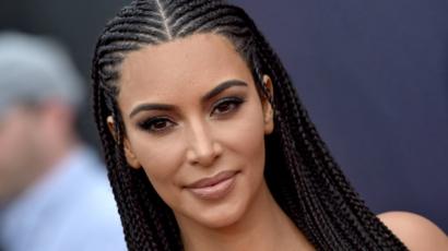 Kim Kardashian Defends Wearing Hair In Braids I M Not Tone
