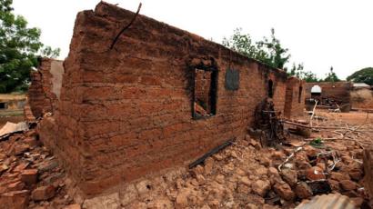 A picture taken on May 10, 2016 in Okokolo-Agatu in Benue State, north-central Nigeria shows a burnt house following attacks by Fulani herdsmen.