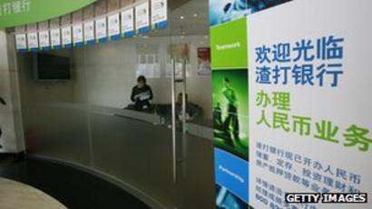 Standard Chartered Banker Detained By China Authorities Bbc News