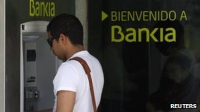 Spanish Banks Have Credit Ratings Cut By Moody S Bbc News