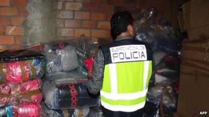 Spain Police Crack Down On Counterfeit Clothing Ring Bbc News