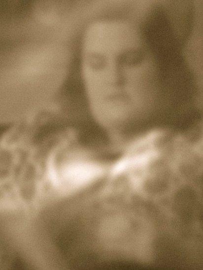 Pinhole photo of a woman