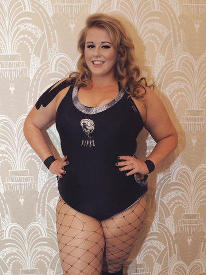 Woman in wrestling outfit