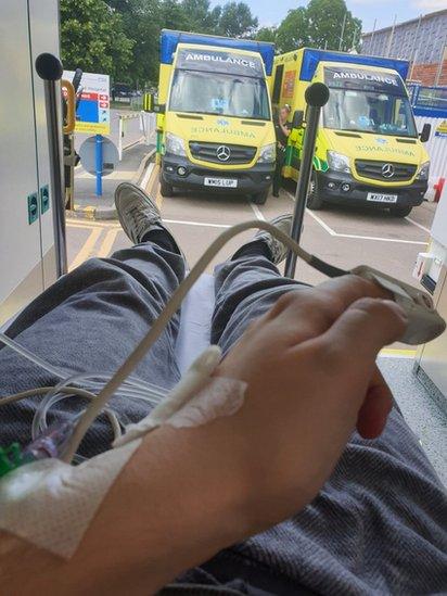 Aaron in an ambulance
