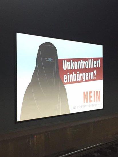 Poster image in a Zurich train station