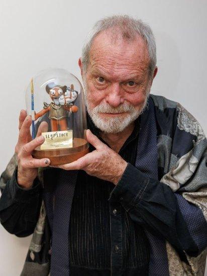 Terry Gilliam holding his morph